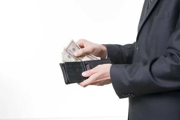 Affärsman med pengar i plånboken i händer — Stockfoto