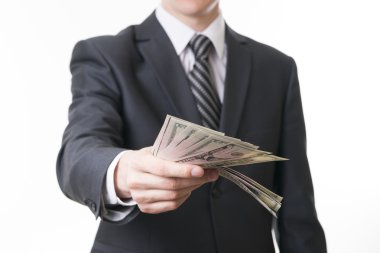 Stüdyoda parası olan bir iş adamı.