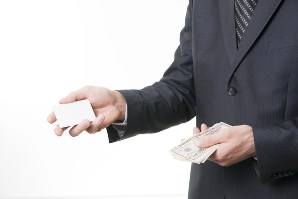 Businessman with bank card and dollars — Stock Photo, Image