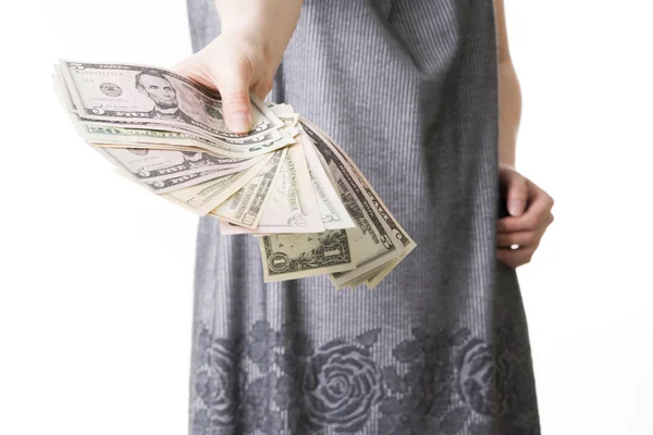 Woman with money in studio — Stock Photo, Image