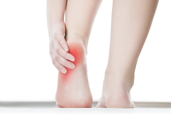 Pain in the female foot — Stock Photo, Image