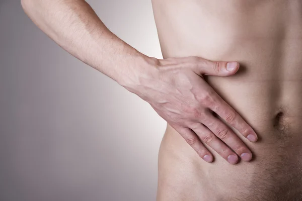 Pijn aan de rechterkant. Aanval van appendicitis — Stockfoto