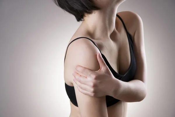 Woman with pain in shoulder. Pain in the human body — Stock Photo, Image