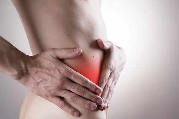 Dolor en el cuerpo de un hombre. Ataque de apendicitis — Foto de Stock