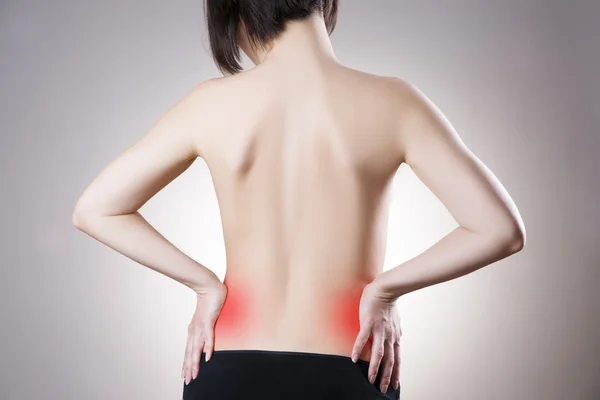 Mulher com dores nas costas. Dor no corpo humano — Fotografia de Stock