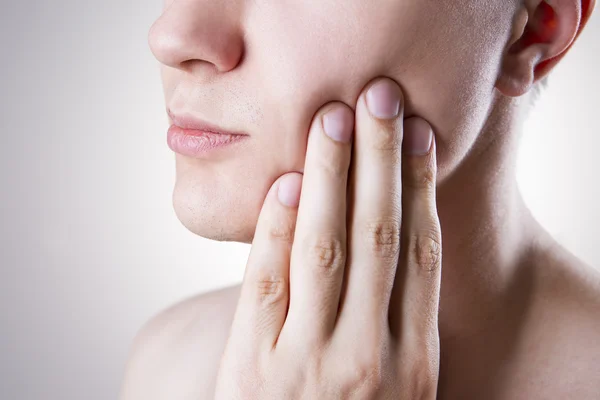 Man with a toothache. Pain in the human body — Stock Photo, Image