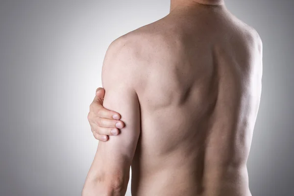 肩の痛みを持つ男。人間の体の痛み — ストック写真