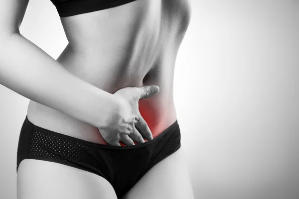 Woman with abdominal pain. Pain in the human body — Stock Image Woman with abdominal pain. Pain in the human body Royalty Free Stock Photos