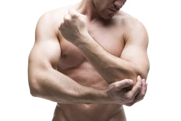 Dolor en el codo. Cuerpo masculino muscular. Aislado sobre fondo blanco —  Fotos de Stock