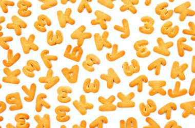 Beyaz bir arka plan, Isola alfabesine şeklinde kurabiye