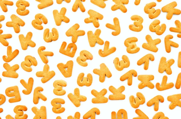 Biscotti sotto forma di alfabeto su sfondo bianco, isola — Foto Stock
