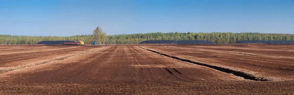 Panorama of the field with peat. — Stock Photo, Image