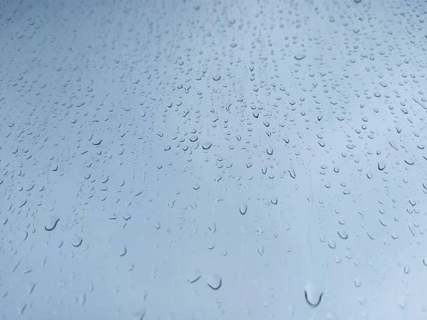 Σταγόνες Βροχής Ένα Παράθυρο Από Κοντά Αφηρημένο Μπλε Φόντο — Φωτογραφία Αρχείου