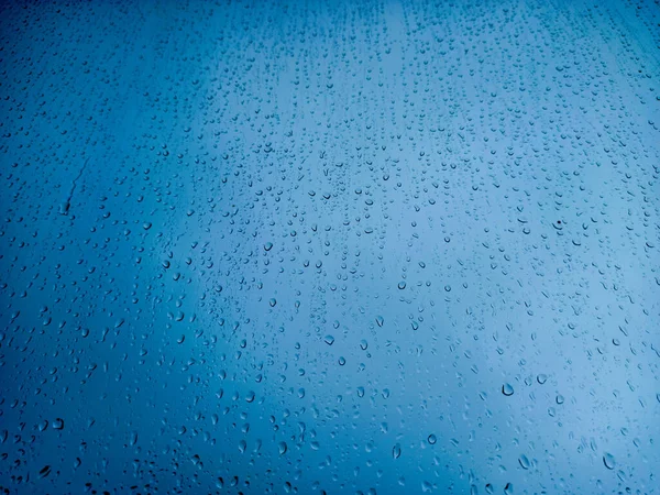 Gotas Chuva Painel Janela Close Fundo Azul Abstrato — Fotografia de Stock