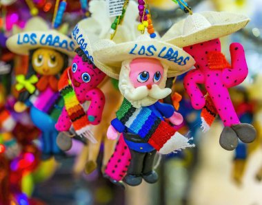 Colorful Mexican Christmas Tree Ornaments Pink Handicrafts Los Cabos Cabo San Lucas Mexico clipart