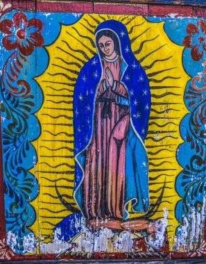 Eski Renkli Kopya Guadalupe Eski San Diego California 'yı boyuyor. Guadalupe, Mexico City 'deki Amerika' daki en önemli Katolik aydınlanma yeridir..
