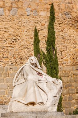 White Saint Teresa Statue Avila Castle Walls Arch Castile Spain clipart