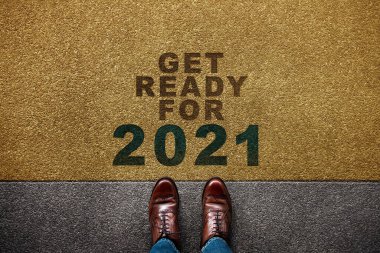 2021 Year Concept. Top View of Businessman Standing on the Floor. Get Ready to Steps Forward to New Challenge. Metaphor Photo clipart