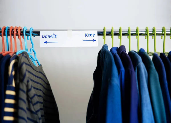 Donation Concept Separated Used Old Clothes Wardrobe Rack Keep Donate — Stock Photo, Image