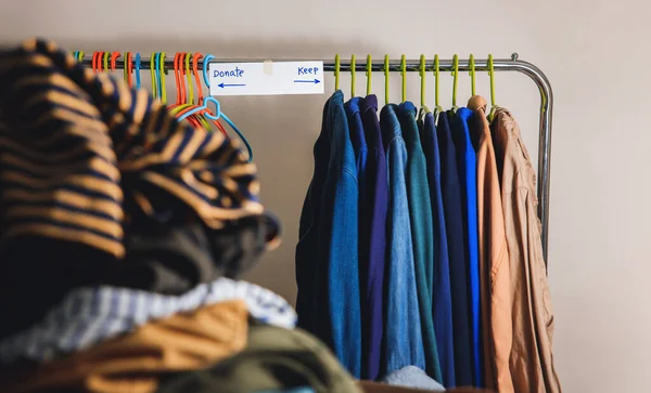 Donation Concept Separated Used Old Clothes Wardrobe Rack Keep Donate — Stock Photo, Image