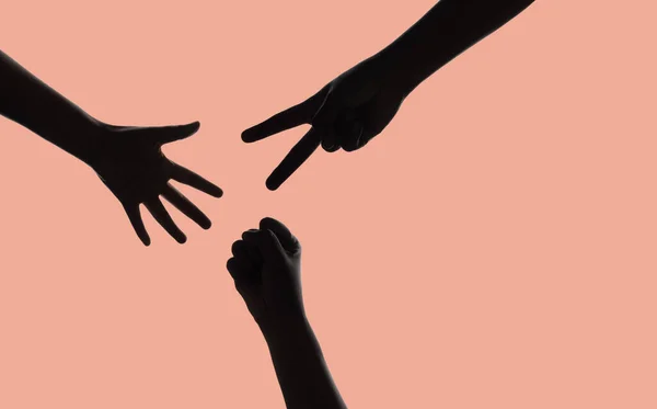 Silhouette Hands Gesture Rock Paper Ψαλίδι Παιχνίδι Απομονώνονται Ροζ Φόντο — Φωτογραφία Αρχείου