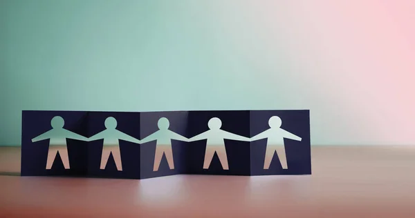 团队合作 伙伴关系 人道和团结概念 人物形象在折叠纸 隐喻图片上被剪下来 手牵手的人 — 图库照片