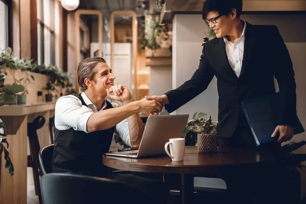 Happy Diversity Business People making Handshake Greeting. Partnership or Teamwork Concept