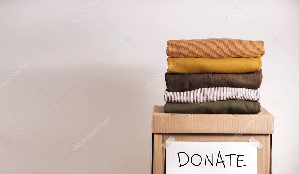 Clothes Donation, Renewable Concept.Box of Use Old Cloth. Preparing Garment at Home before Donate