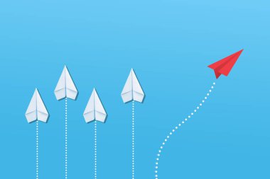 Kırmızı kağıt uçak beyaz kağıt uçaktan yön değiştiriyor. Yeni fikirler. Kağıt sanatı. yaratıcı fikir