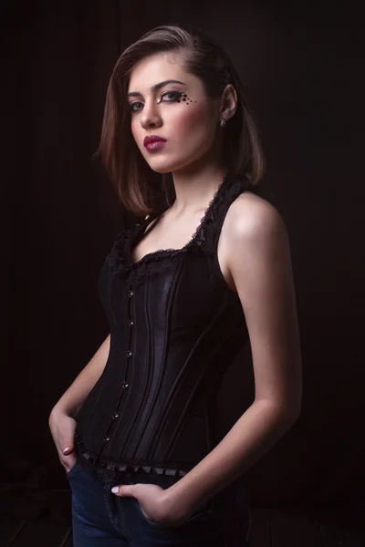 Girl in a corset — Stock Photo, Image