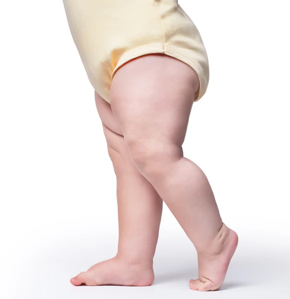 Only foot, baby goes on the background — Stock Photo, Image
