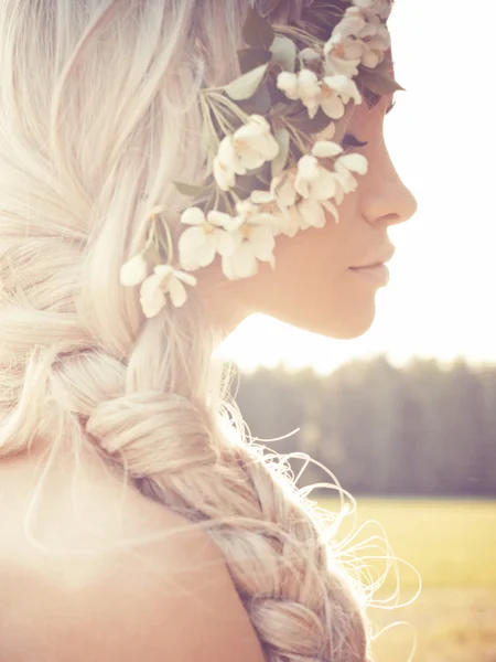 Romantic lady in wreath of apple trees — Stock Photo, Image