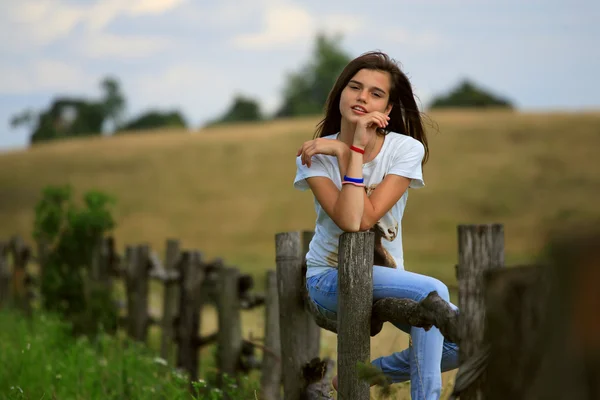 Teenage girl get fun at the farm — Stock Photo, Image