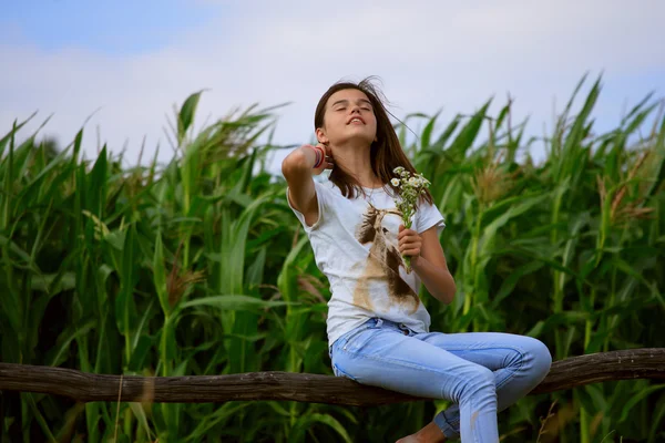 Teenage girl get fun at the farm — Stock Photo, Image