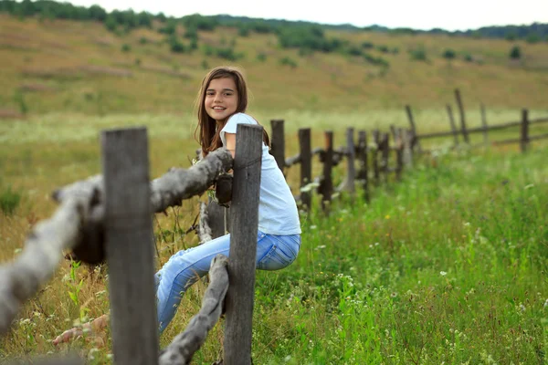 Teenage girl get fun at the farm — Stock Photo, Image