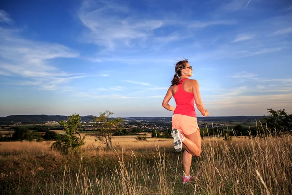 De jogging vrouw — Stockfoto