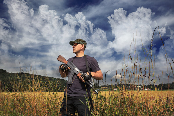 Masked militant with  gun