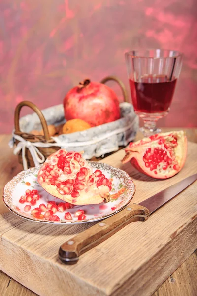 Pomegranate and nuts — Stock Photo, Image