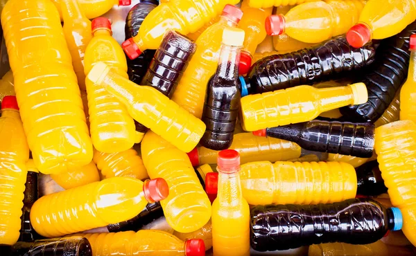 Juice bottles background — Stock Photo, Image