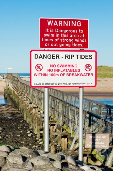 Sinal de aviso de maré — Fotografia de Stock