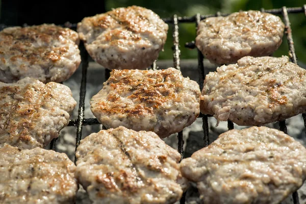 Barbecue in nature. Baking meatballs on charcoal — Stock Photo, Image