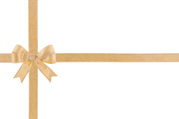 Golden ribbon with a bow on white background — Stock Photo, Image