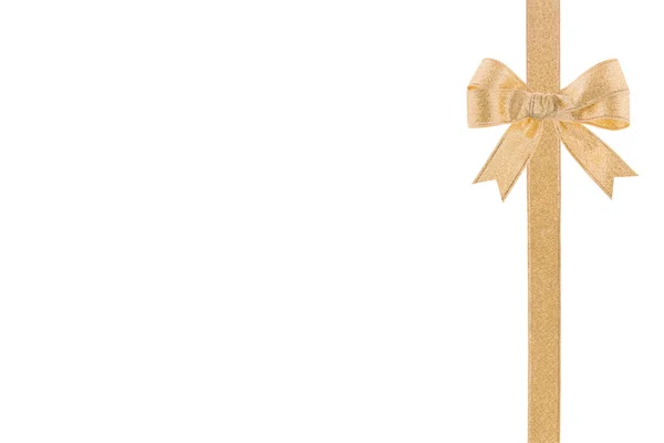 Zlatá stuha s lukem na bílém pozadí — Stock fotografie