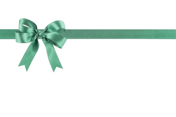 Green ribbon with a bow on white background — Stock Photo, Image