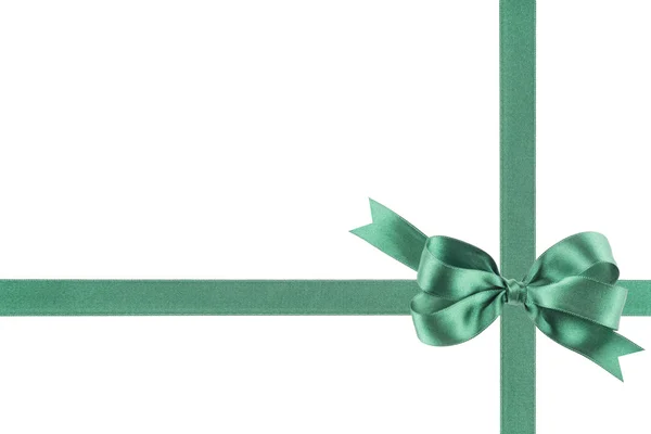 Green ribbon with a bow on white background — Stock Photo, Image