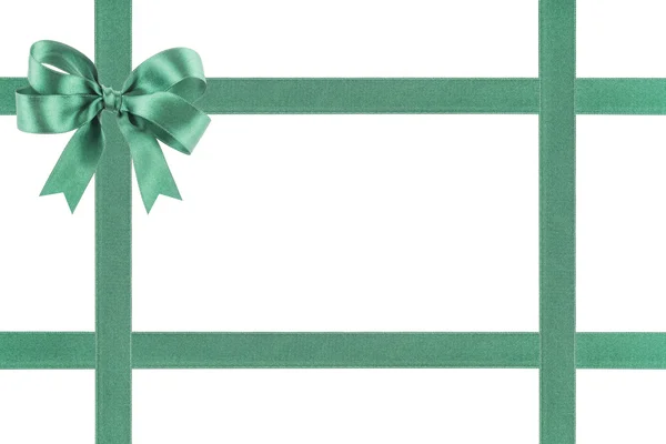 Green ribbon with a bow on white background — Stock Photo, Image