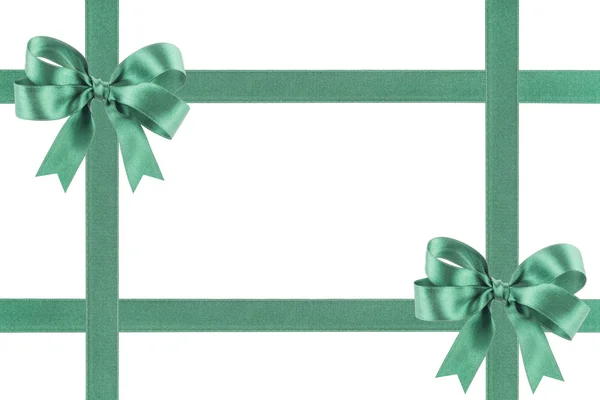 Green ribbon with a bow on white background — Stock Photo, Image