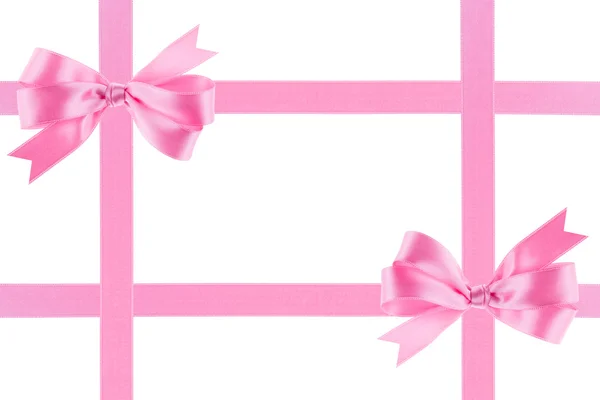 Pink ribbon with a bow on white background — Stock Photo, Image