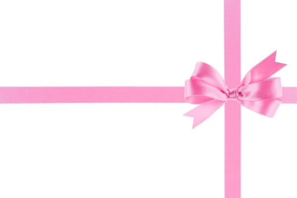 Pink ribbon with a bow on white background — Stock Photo, Image