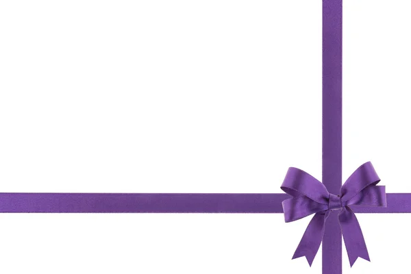 Purple ribbon with a bow on white background — Stock Photo, Image